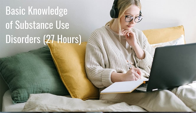 A woman sits on a couch working in her online CASAC training BASIC Knowledge of Substance use Disorders.