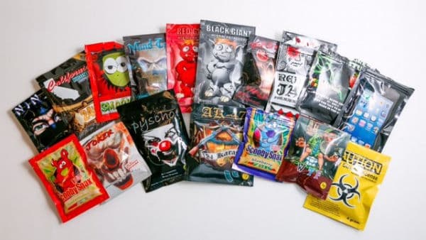Image of pacakges of Street named synthetic marijuana including Spice, K2, Green Giant, Smacked, Wicked X, AK-47, Geeked Up, Ninja, Caution, Red Giant, and Keisha Kole, XXX Ultra, Skunk, Atomic and many more.