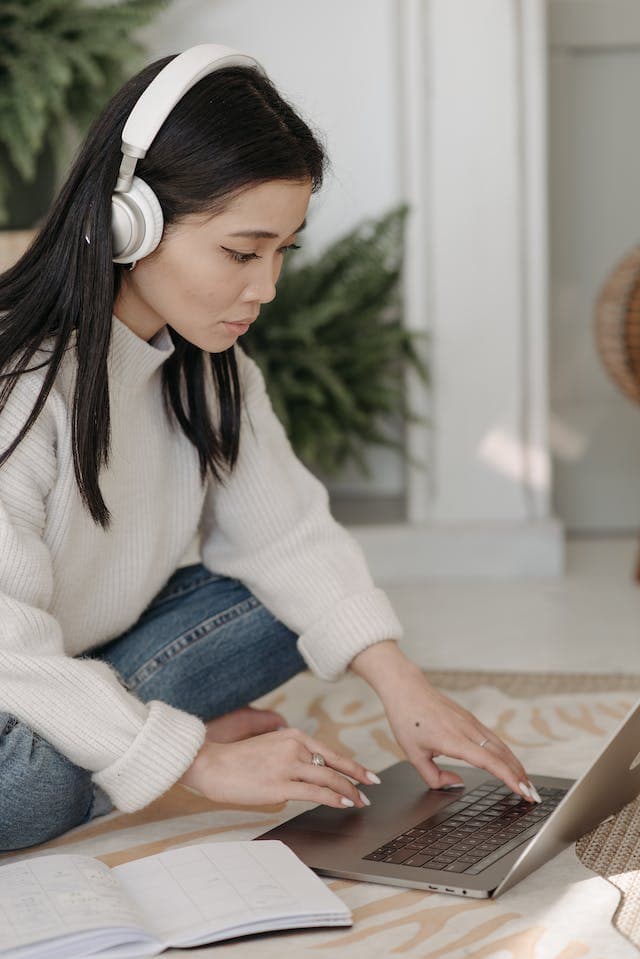 image of a woman studying her addiction counselor courses for drug counseling certification from the connivence of her home.1
