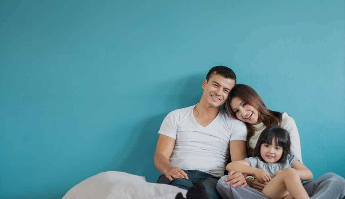 Picture of a happy family who is no longer struggling with substance use disorders and pregnancy thanks to utilizing an integrated care approach.