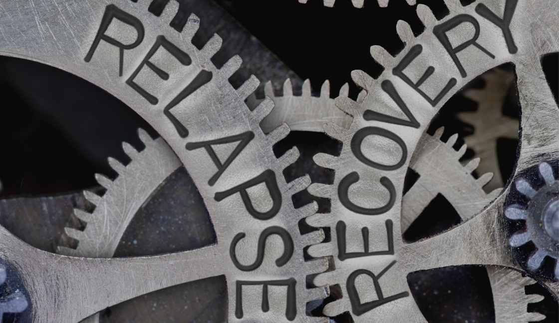 Two gears Gears working together as a symbol of relapse prevention online addiction counselor training