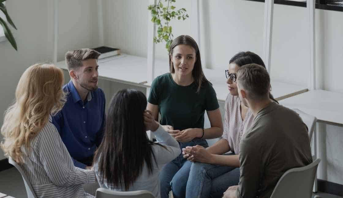 A group of CASAC training students practice group counseling during drug counselor certificate programs online.